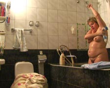 washing mature woman